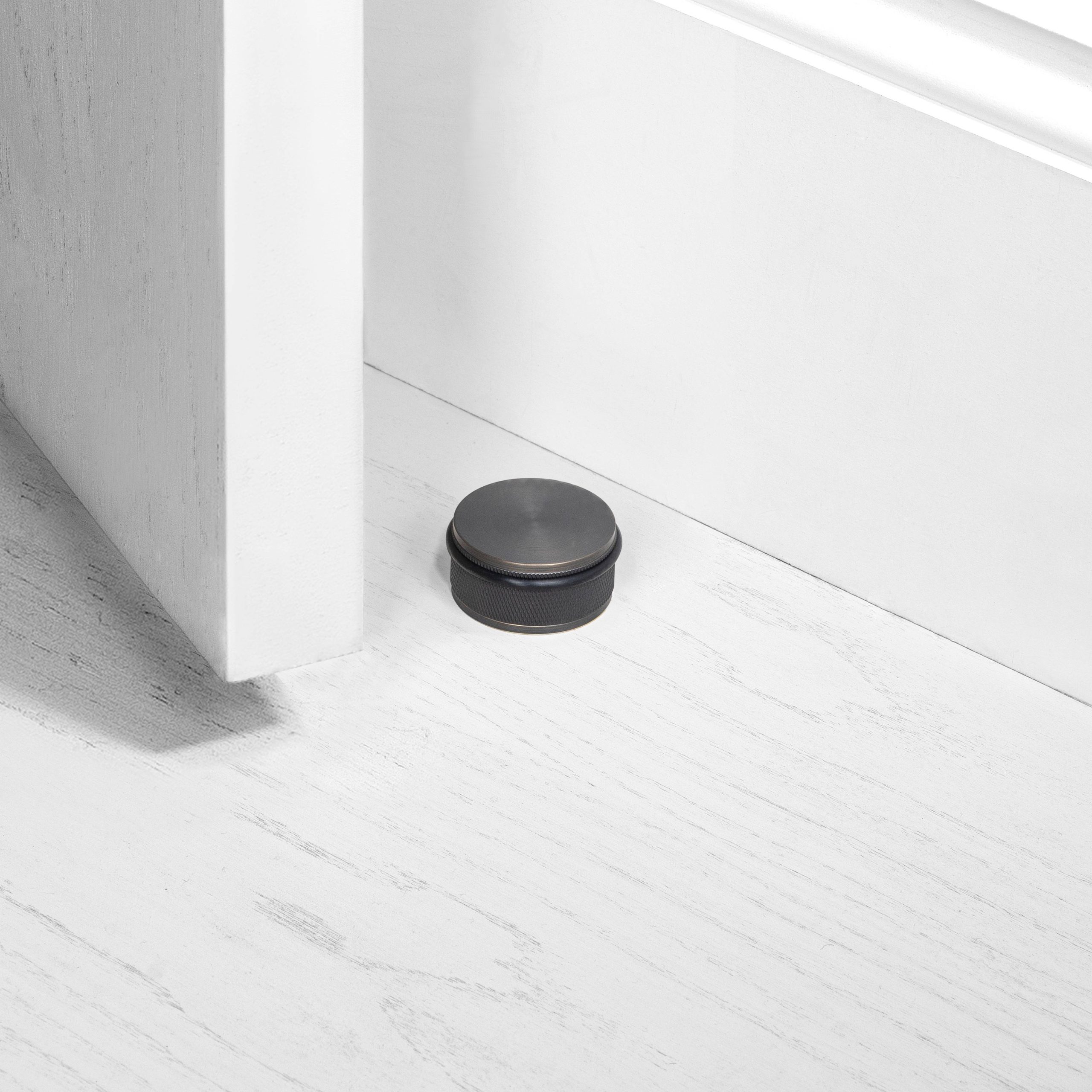 DOOR STOP / FLOOR / CROSS / SMOKED BRONZE